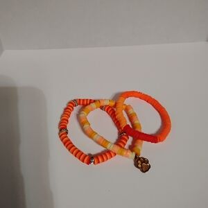 Handmade three piece multicolored kids or adults heishi beaded bracelet set